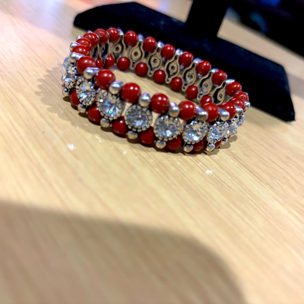Red bracelet with diamonds